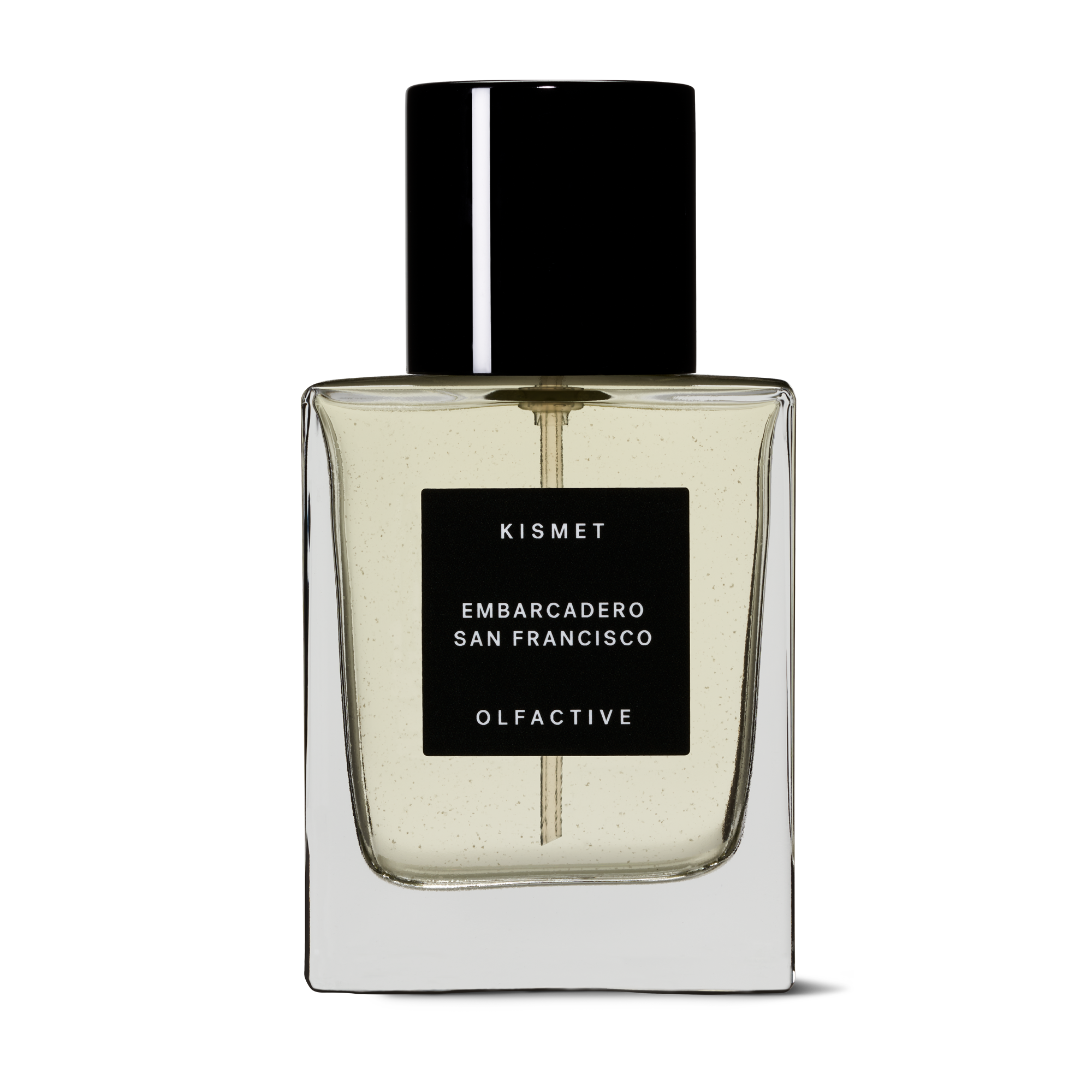 A clear glass bottle of Kismet perfume with a black label and a black cap, labeled 'Embarcadero San Francisco OLFACTIVE'.