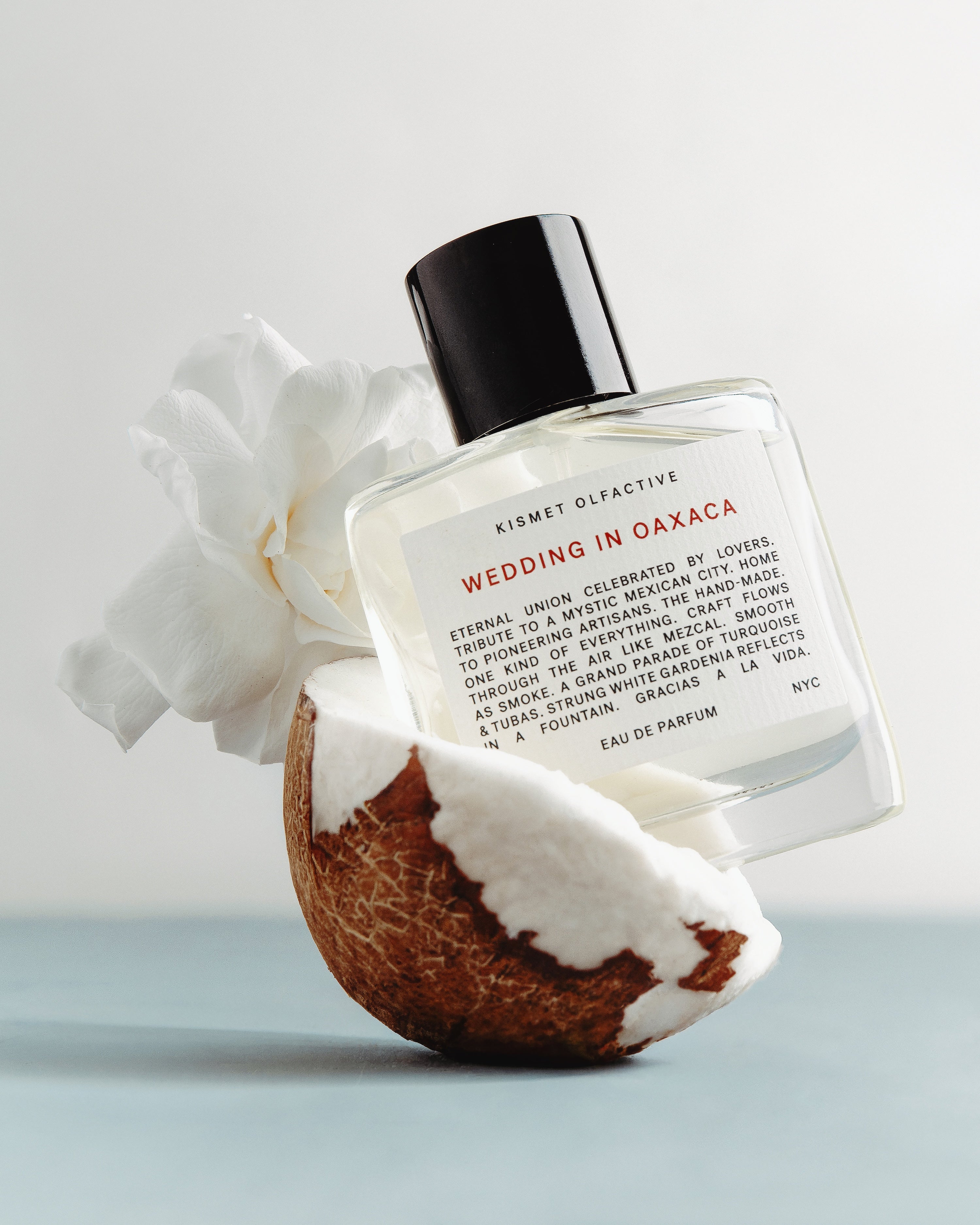 50ml perfume bottle of Wedding in Oaxaca in a coconut with a white rose. 