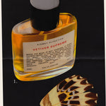 A 50ml bottle of Kismet Olfactive Vetiver Supreme Eau de Parfum with amber liquid and a black cap, shown against a black background with a butterfly wing graphic below and numbered callouts 1 and 2.